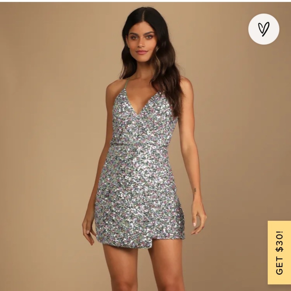 Beautiful sequins mini dress. Definitely a head turner!!! Brand new!